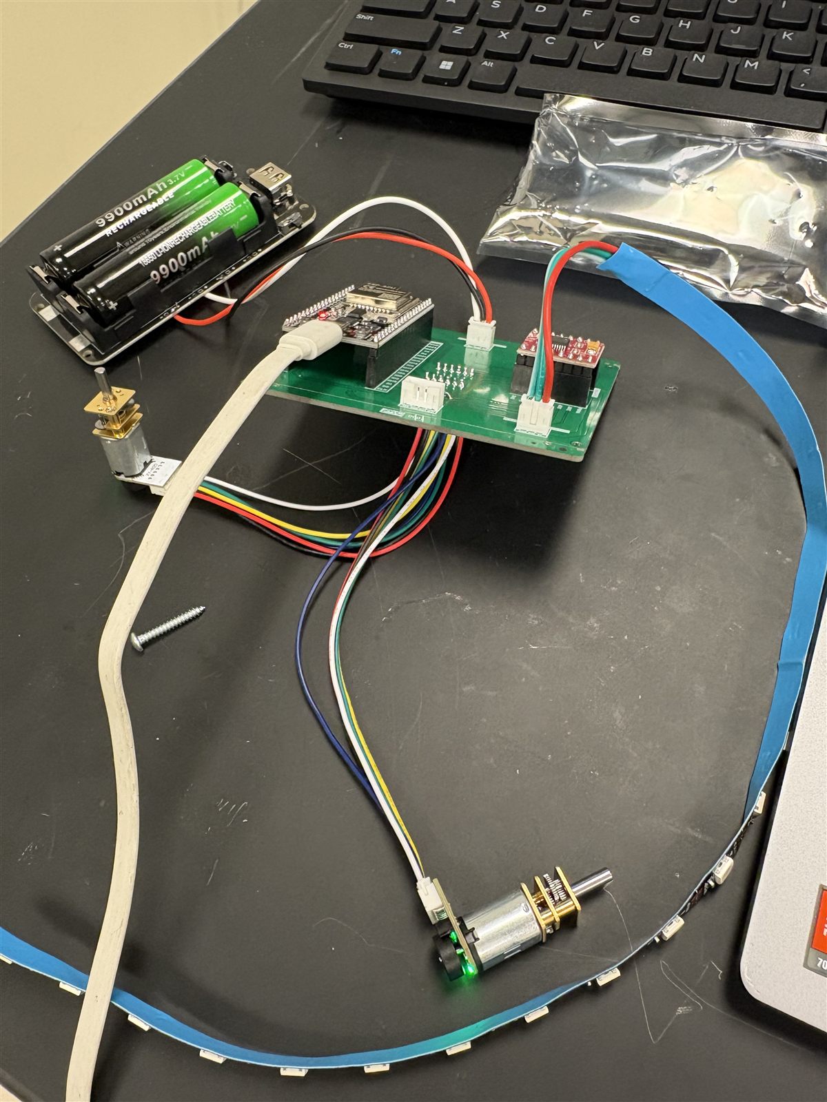 Bench test with battery, motors and LED strip connected